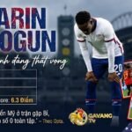 Tiền đạo Folarin Balogun cúi đầu thất vọng với màn trình diễn mờ nhạt, thống kê 0 bàn thắng trong trận tuyển Mỹ thua Bỉ 1-4 tại vòng 1/8 World Cup 2026.